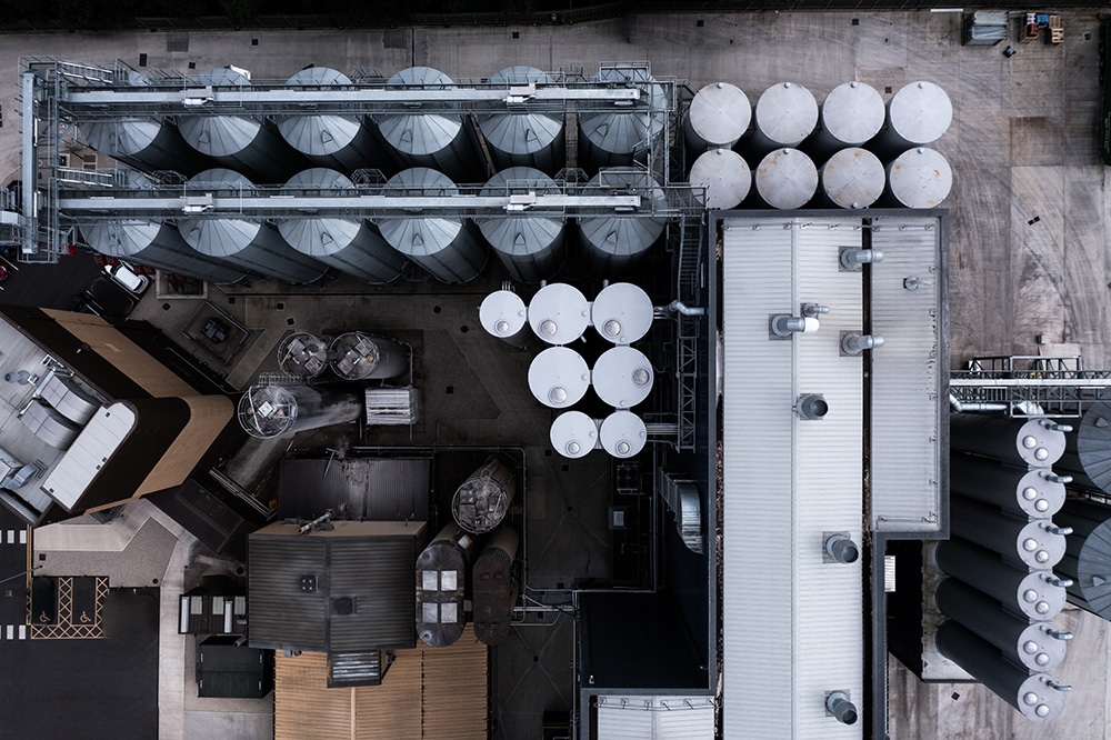 Aerial view directly above food or chemical storage cylinders